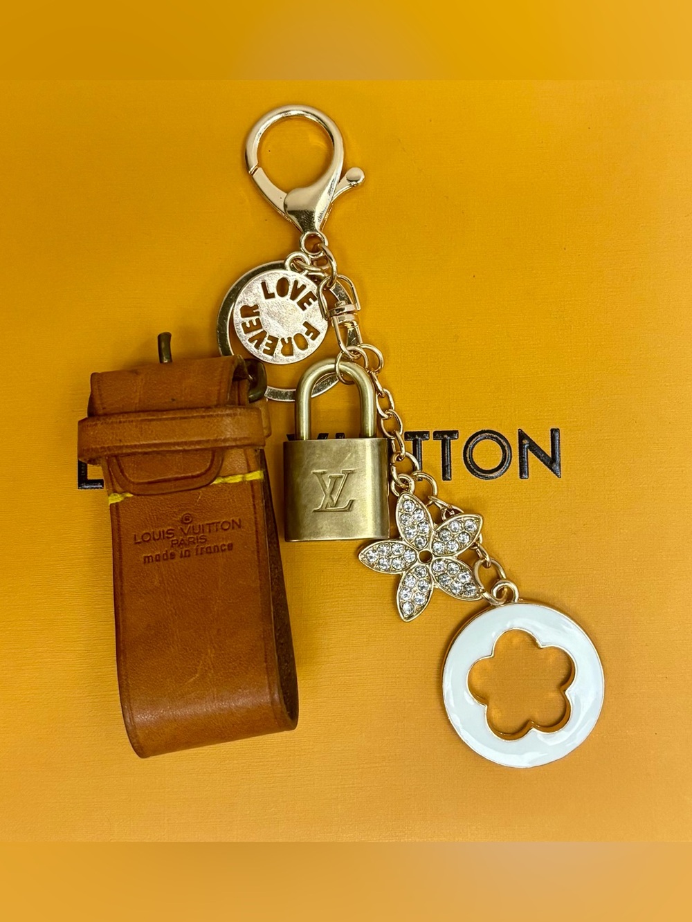 Louis Vuitton Brass Lock, LV Poignet, Metal Clover Bag Charm, 6 in.